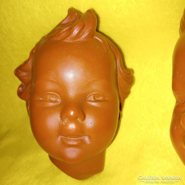 2 db párban Kisfiú-Kislány fej. by W.Goebel  (1957  ).falidísz, figurális szobor.