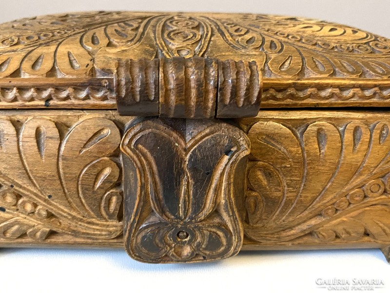 A richly carved wooden box with Hungarian tulips marked 1953