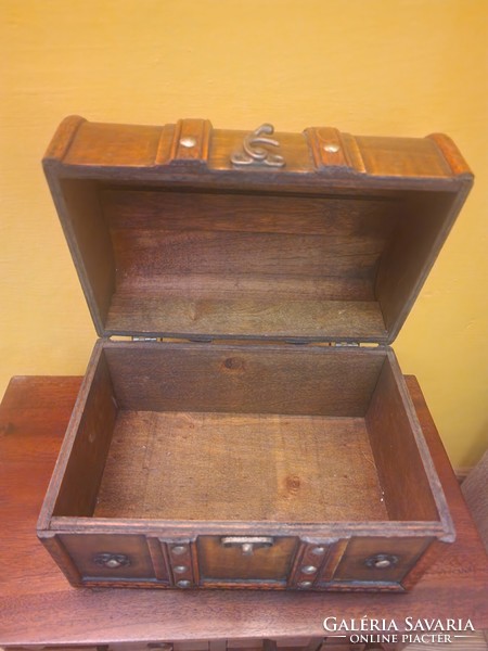 Ancient jewelry wooden box with antique lock