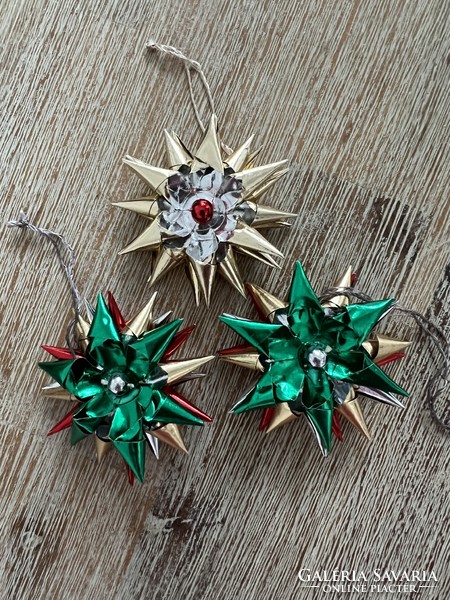 Three old paper stars Christmas tree decoration