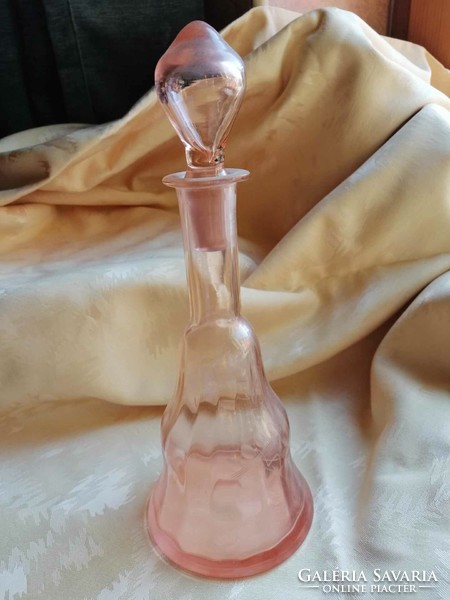 Salmon colored polished liquor bottle