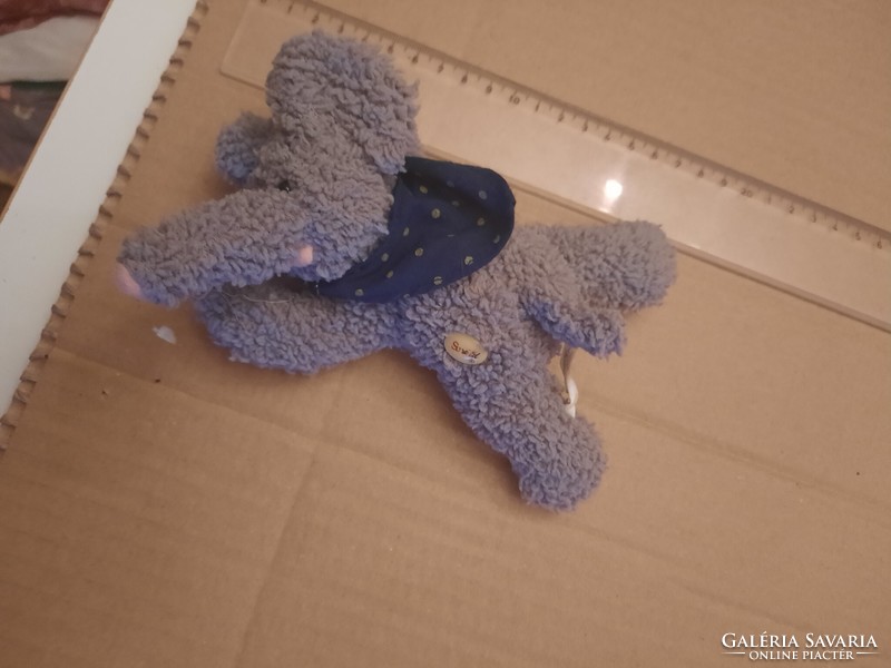 Plush toy, stuffed elephant with a scarf, negotiable