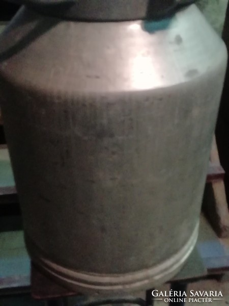 Old large aluminum milk jug, honey jug