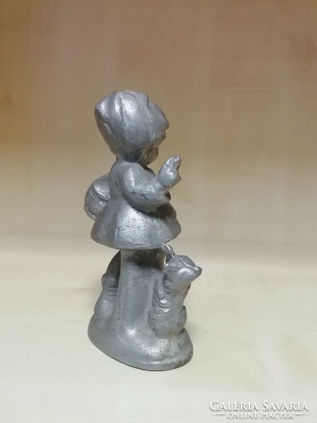 Tin little girl figure