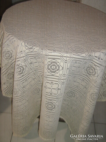 Beautiful ecru lace tablecloth