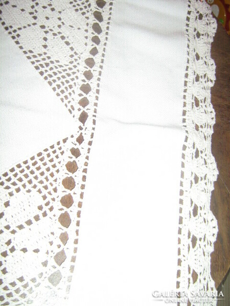 Beautiful tablecloth with beautiful handmade crochet inserts and crochet edges