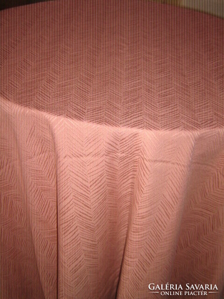 Elegant pale mallow woven tablecloth with a beautiful pattern