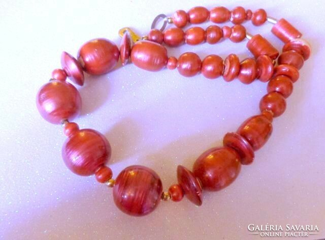 Old wooden lacquered red necklace