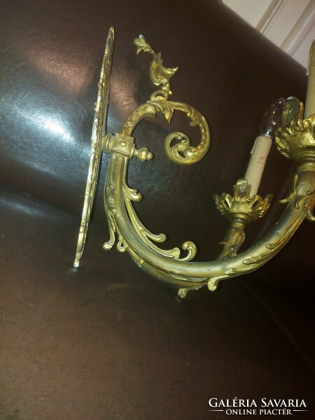 Antique, fire-gilded, copper double wall arm, with internal wiring