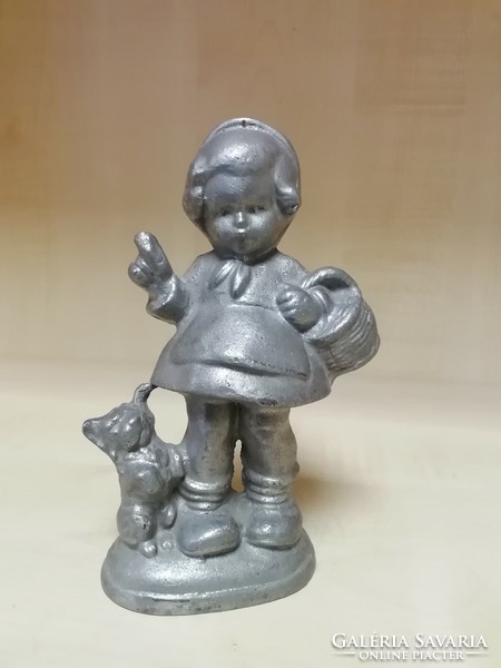 Tin little girl figure