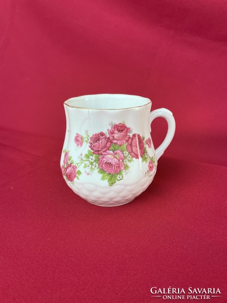 Zsolnay's small rose-brimmed mug is defective