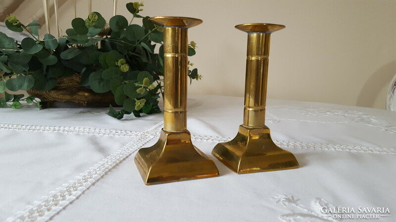 A pair of brass candlesticks