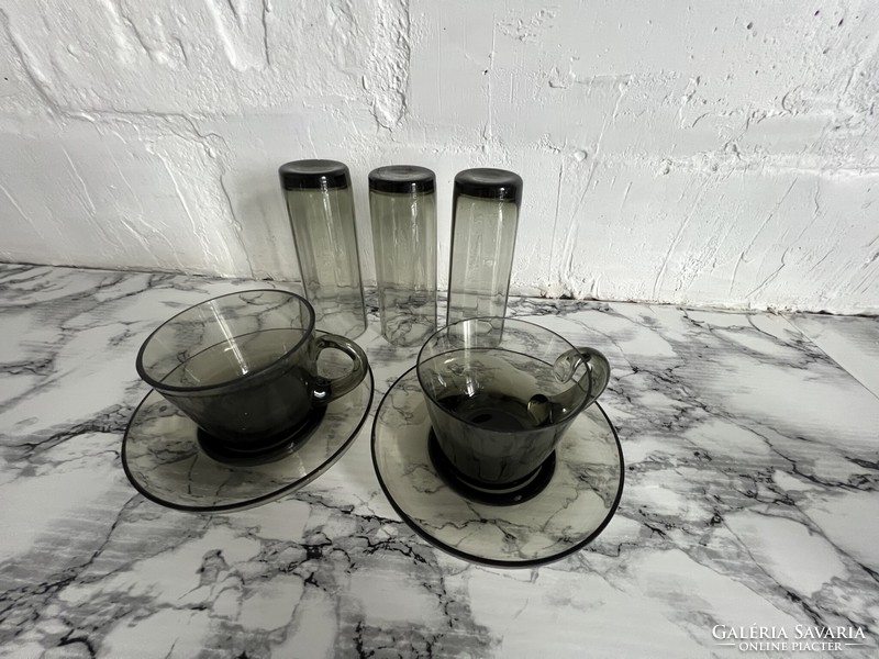 Smoke-colored glass coffee cups and liqueur or brandy glasses