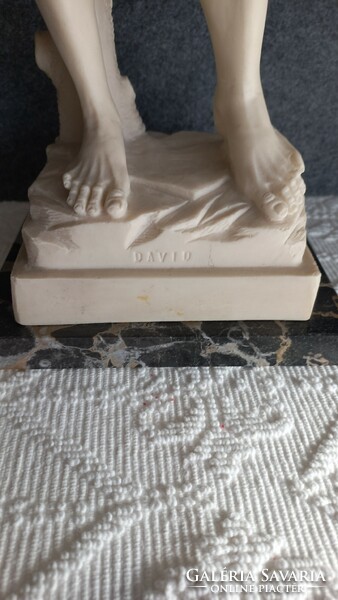 Alabaster nude statue of David on a marble plinth, 49.5 cm, 3838 gr., Plinth 12 x 16.5 cm.