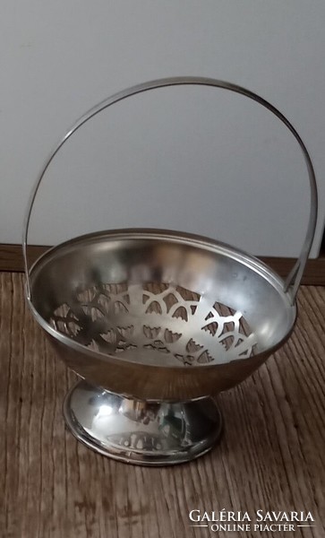 Old metal basket with openwork pattern, serving bowl