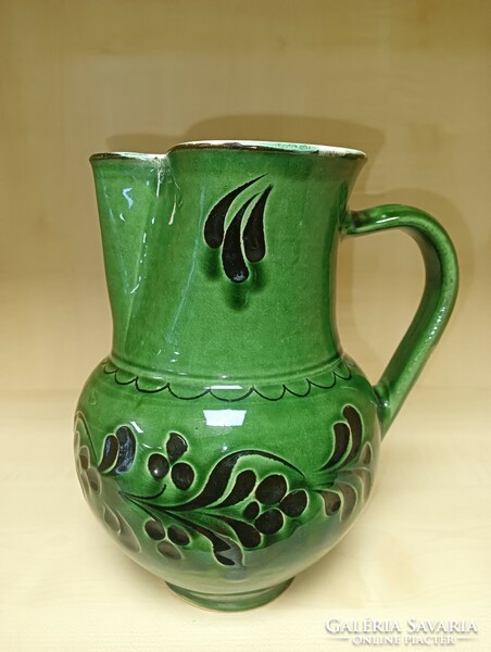 Green glazed ceramic jug