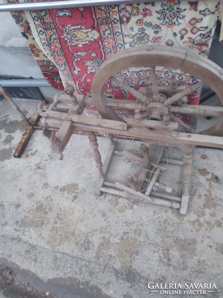 Antique wheelchair, in need of repair