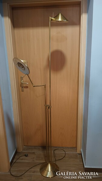 Modern design floor lamp with adjustable arm. Negotiable.