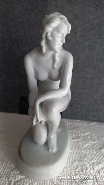 Zsolnay white glazed porcelain kneeling female nude, marked, 23 x 15 x 9 cm