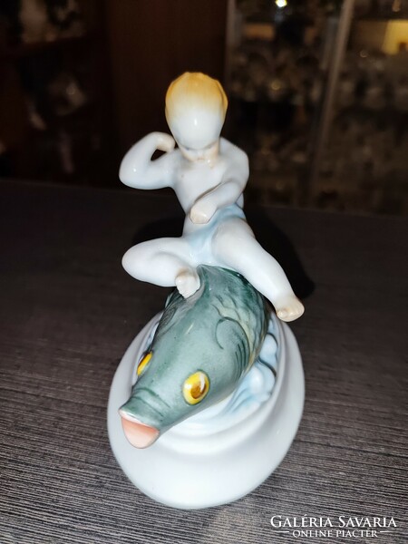 Putto sitting on Herend fish
