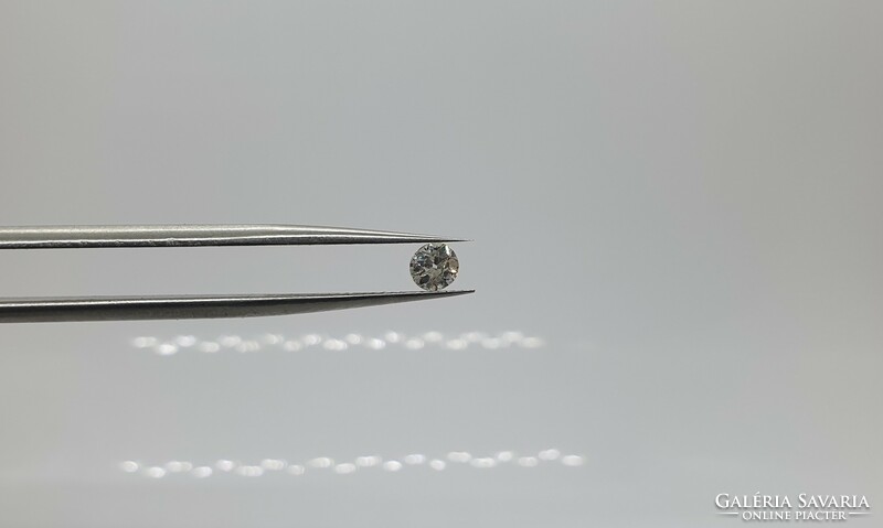 Extra 0.27 carat brilliant-cut diamond. With certification.