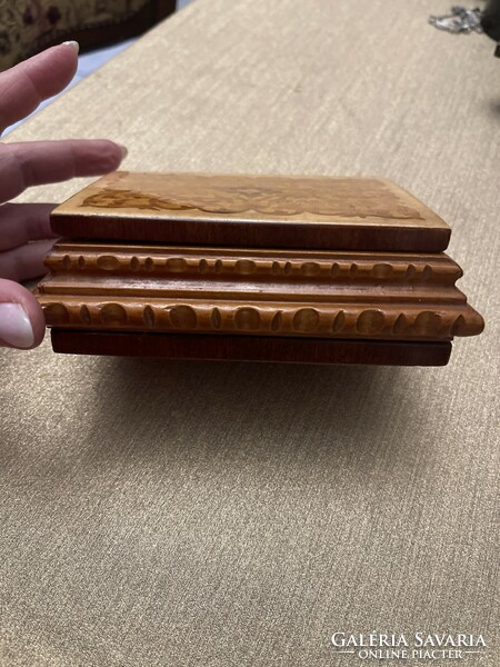 Inlaid wooden jewelry box.