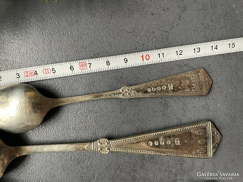 Beautifully patterned nickel silver spoons together