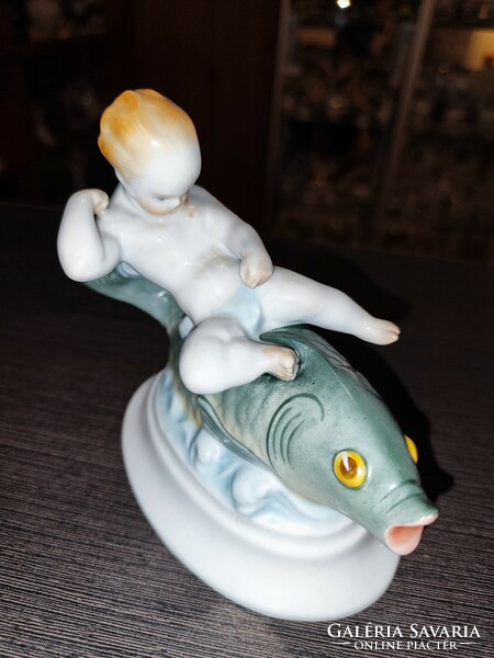 Putto sitting on Herend fish