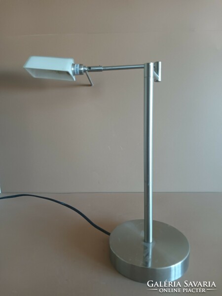 Modern design table lamp with swing arm. Negotiable.