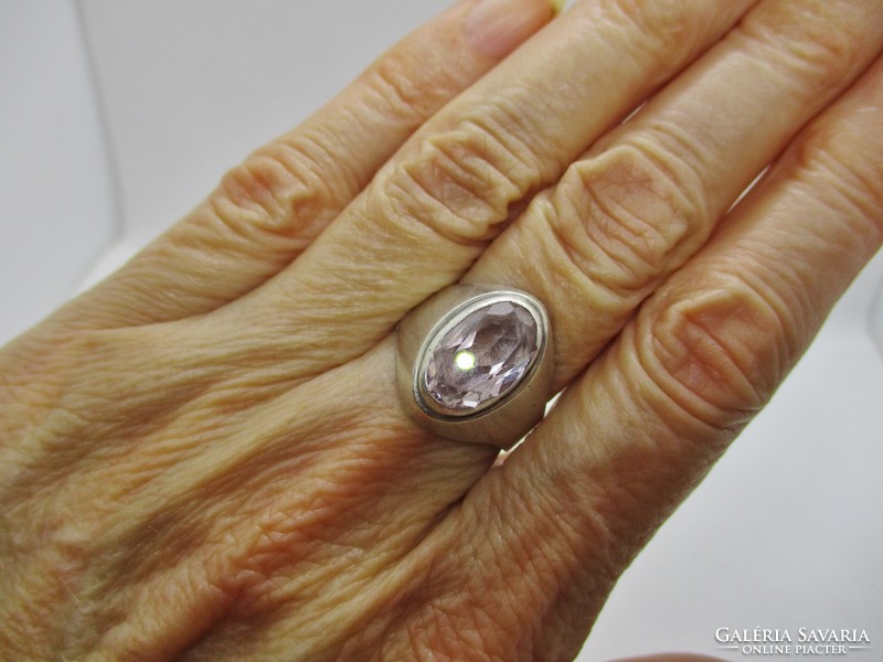 A very elegant art deco style silver ring with a large genuine amethyst stone