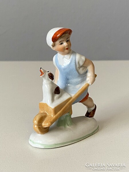 Singing dog wheelbarrow boy painted porcelain figure 8.5 Cm