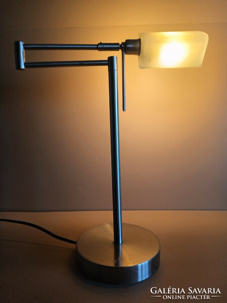 Modern design table lamp with swing arm. Negotiable.