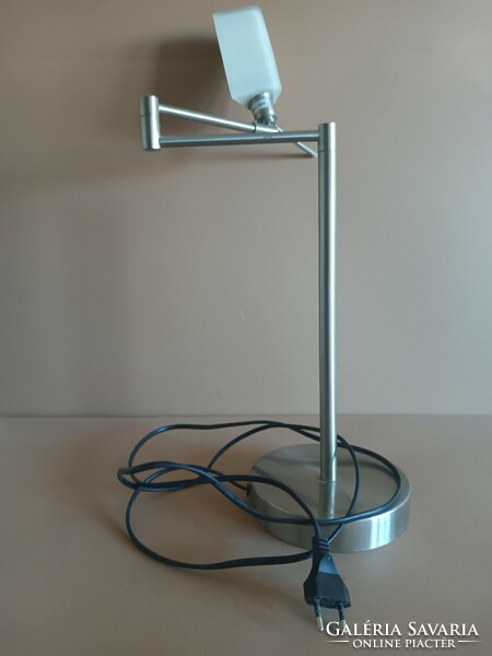 Modern design table lamp with swing arm. Negotiable.
