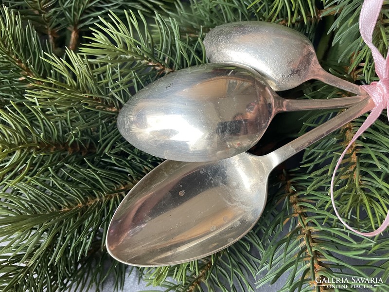 Beautifully patterned nickel silver spoons together