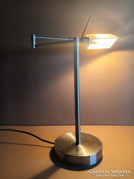 Modern design table lamp with swing arm. Negotiable.