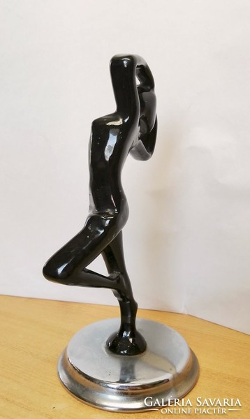 Art deco cast iron dancing lady statue on a chrome plinth. Unique piece