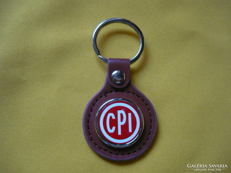 Cpi metal key ring on a leather base