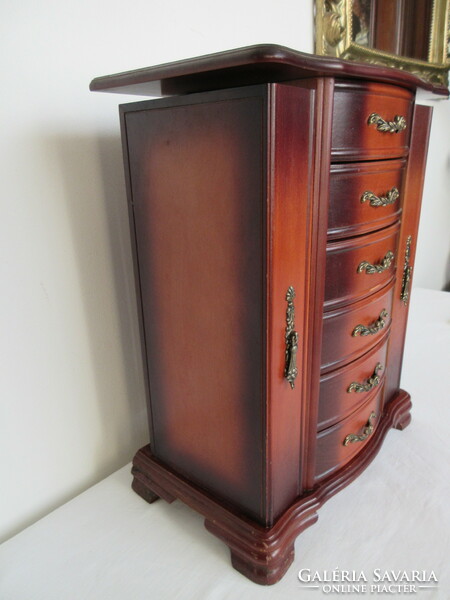 Old, solid wood, huge jewelery storage cabinet. Negotiable!.