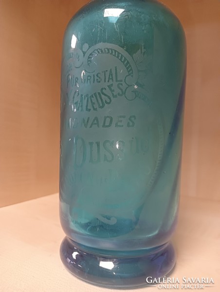 Blue twisted French soda bottle