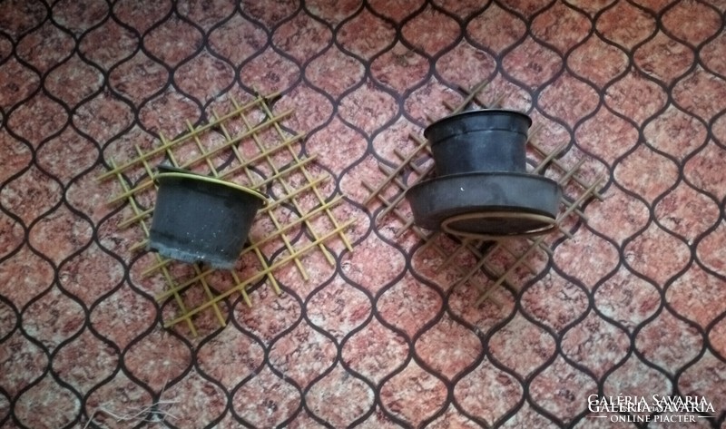 Old retro flower pots with iron lattice