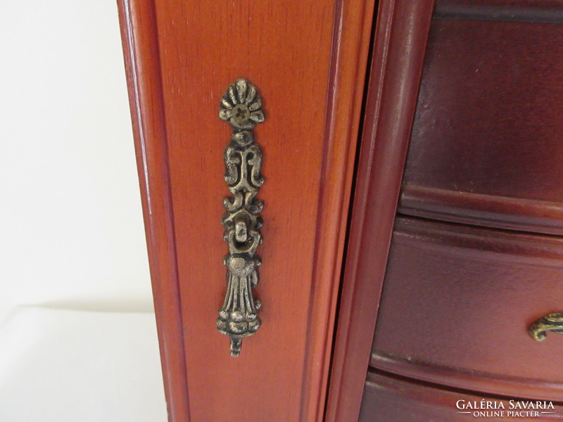 Old, solid wood, huge jewelery storage cabinet. Negotiable!.