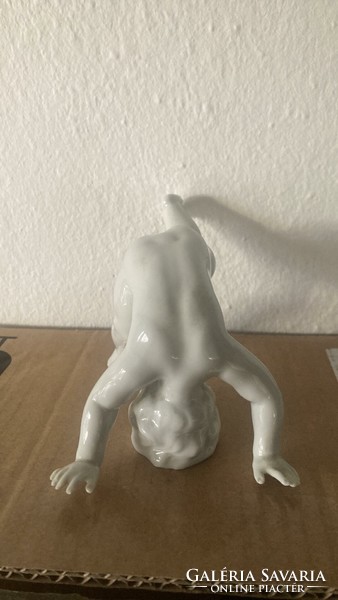 German, white porcelain, boy standing on his head!