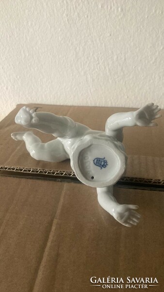 German, white porcelain, boy standing on his head!