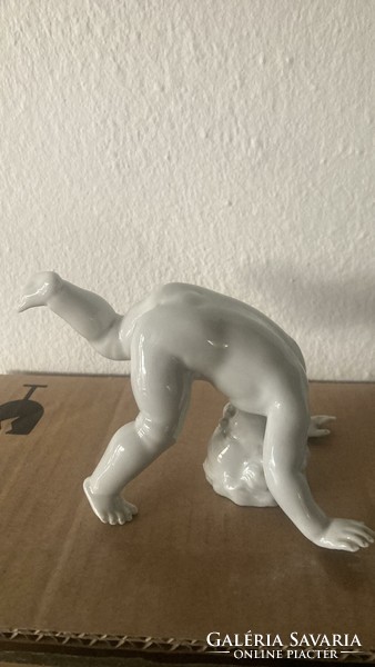 German, white porcelain, boy standing on his head!