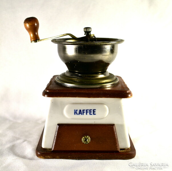 Coffee grinder with porcelain and wooden body