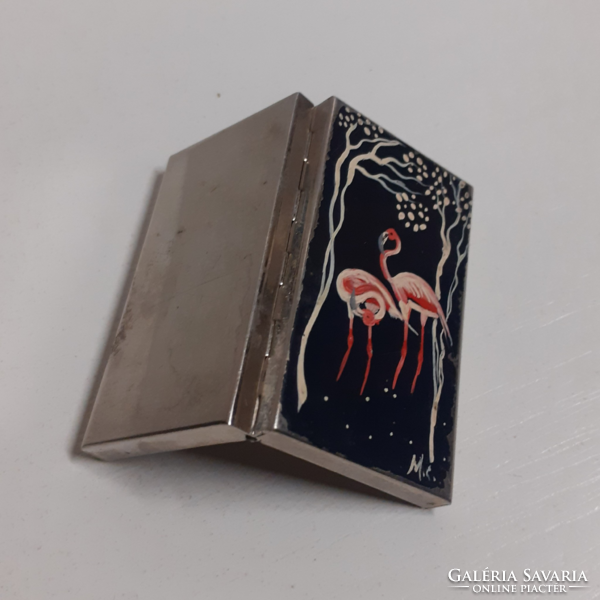 Retro small silver-colored small box with a pelican on the top of the box decorated with a pair of pelicans