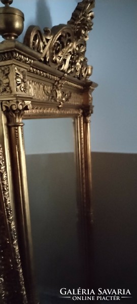 Huge gilded mirror with console table
