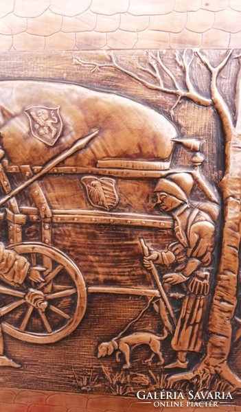 Going to war. A giant-sized, multi-shaped copper relief plaque
