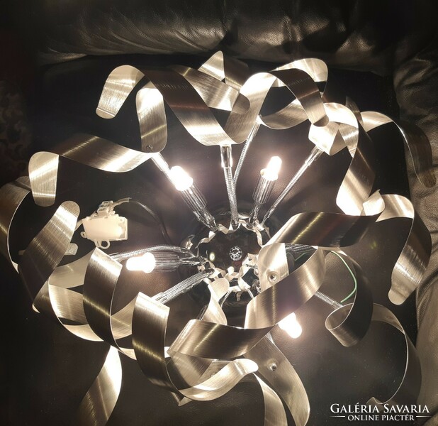 Silver colored metal wall lamp