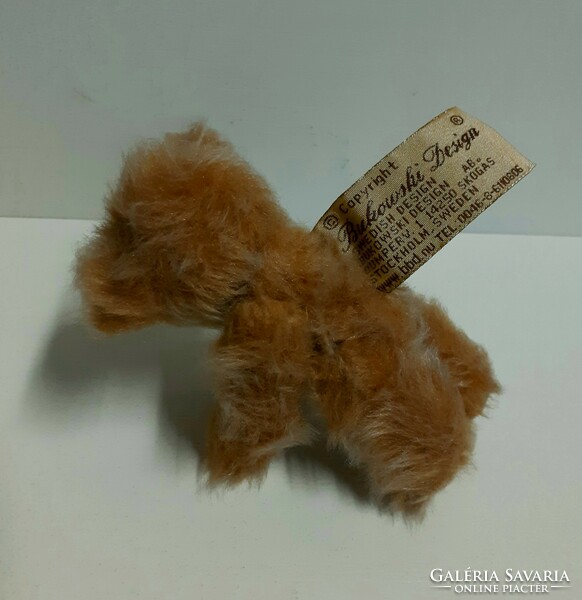 Antique small marked straw teddy bear